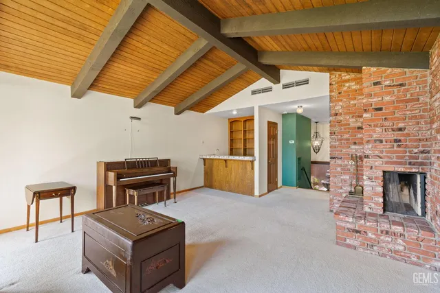 a terrace of a house with outdoor seating