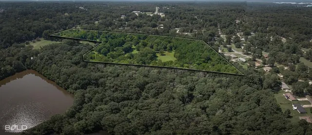 an aerial view of residential house with outdoor space