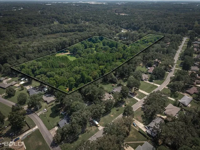 an aerial view of residential house with parking space