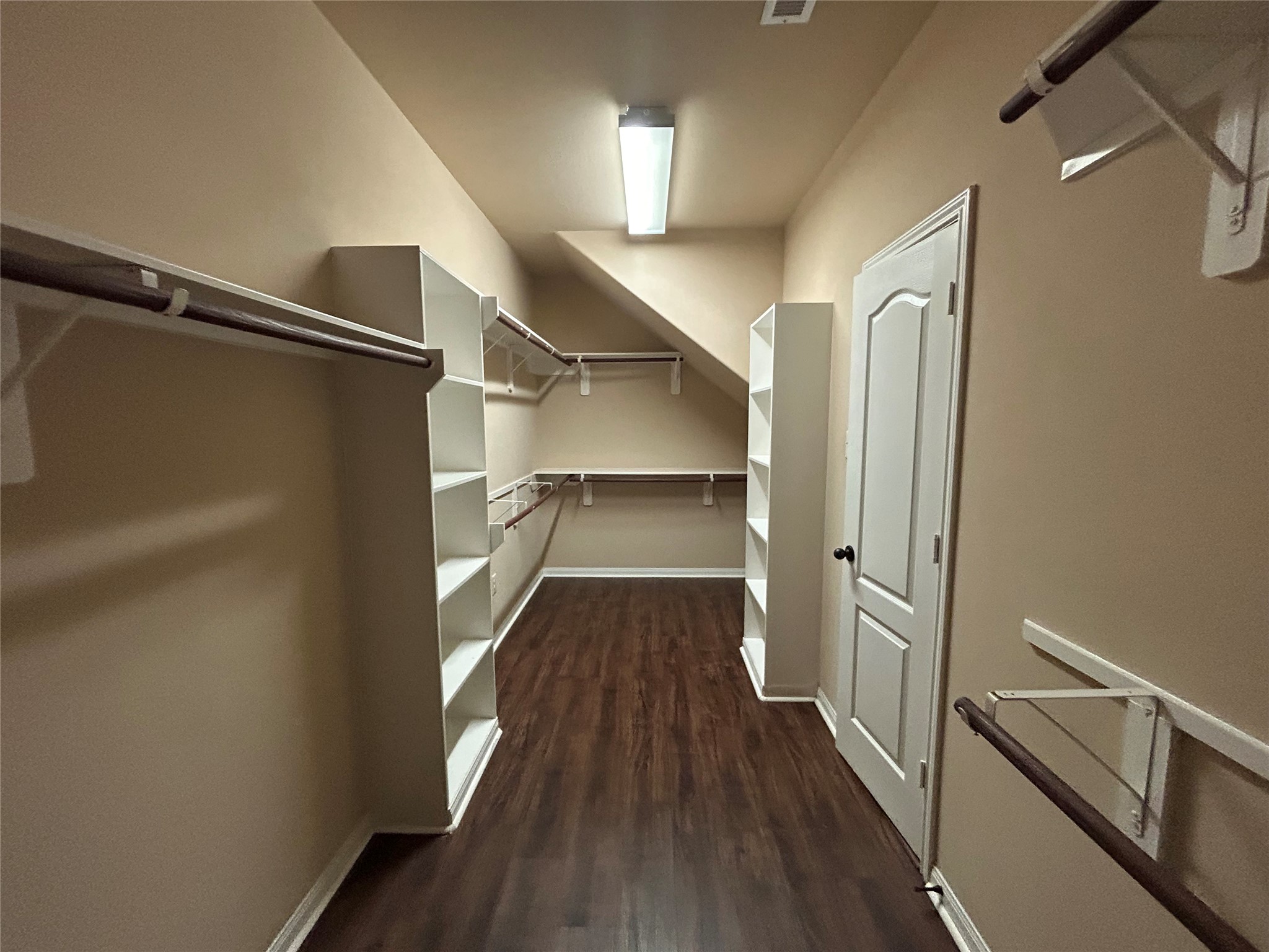 7936 Lake Commons Drive Rosenberg, TX 77469 - Photo 22 of 34 a view of a hallway with wooden floor and staircase