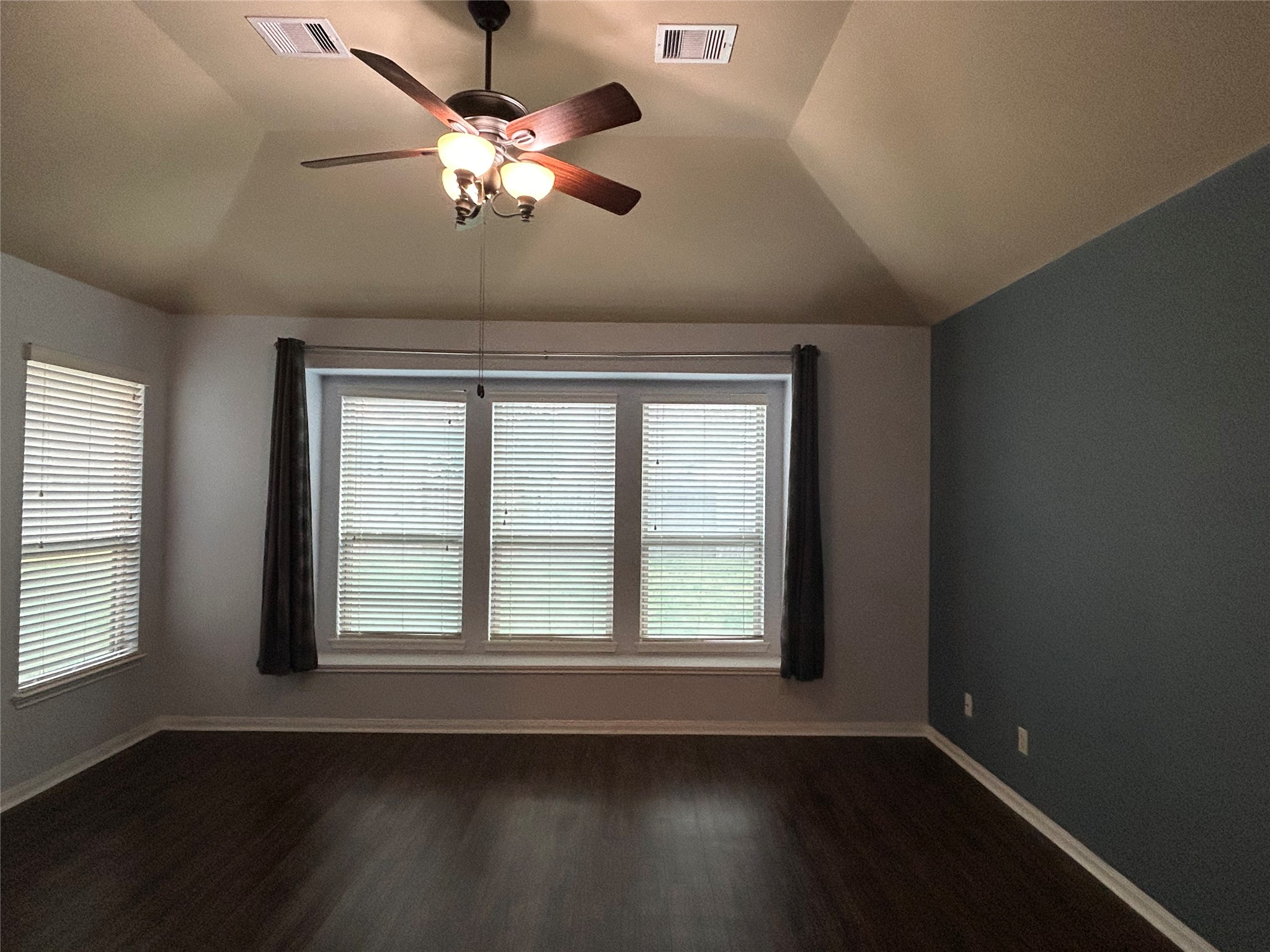 7936 Lake Commons Drive Rosenberg, TX 77469 - Photo 26 of 34 a view of an empty room with wooden floor and a window
