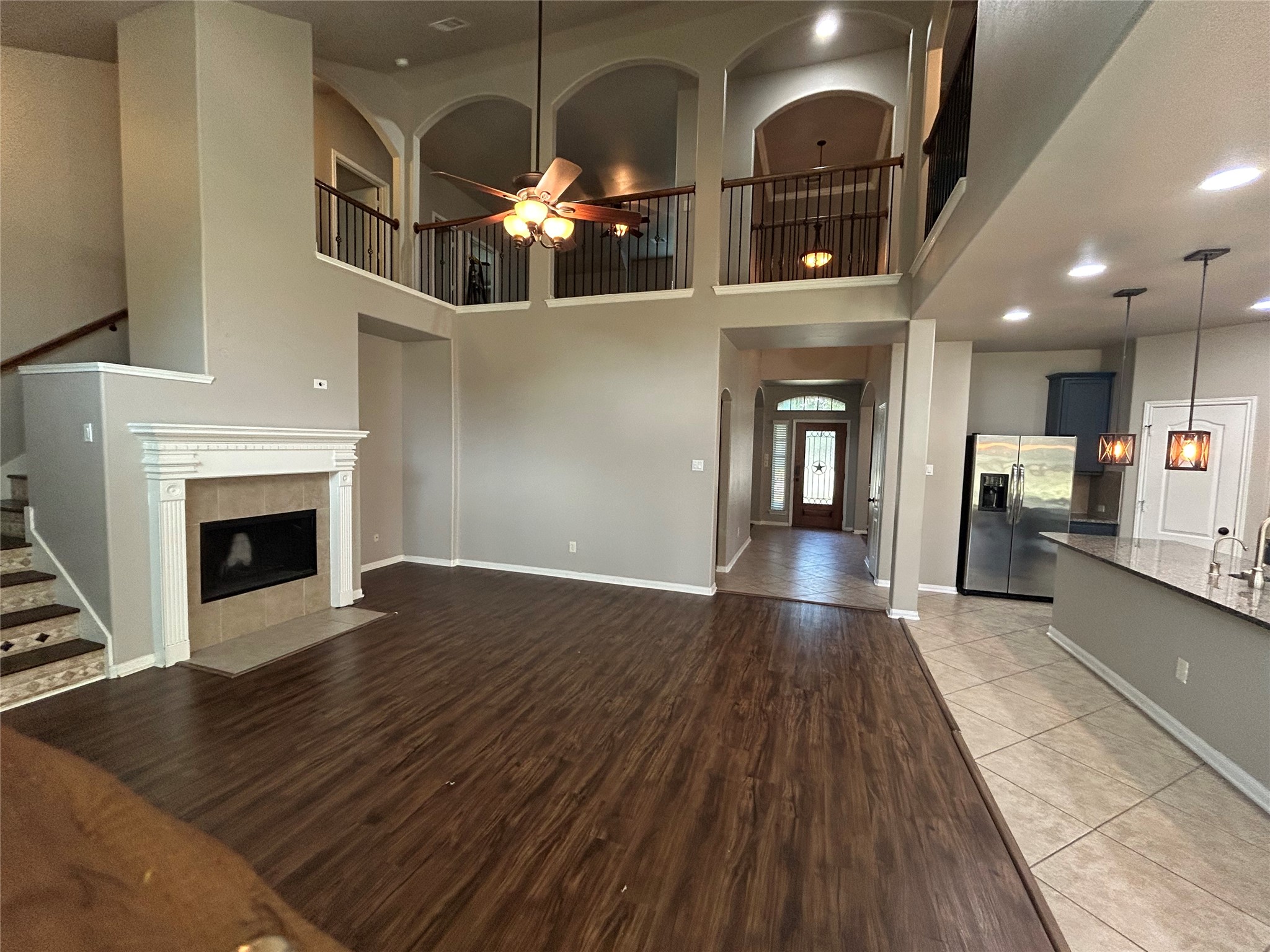 7936 Lake Commons Drive Rosenberg, TX 77469 - Photo 8 of 34 a view of entryway and hall with wooden floor