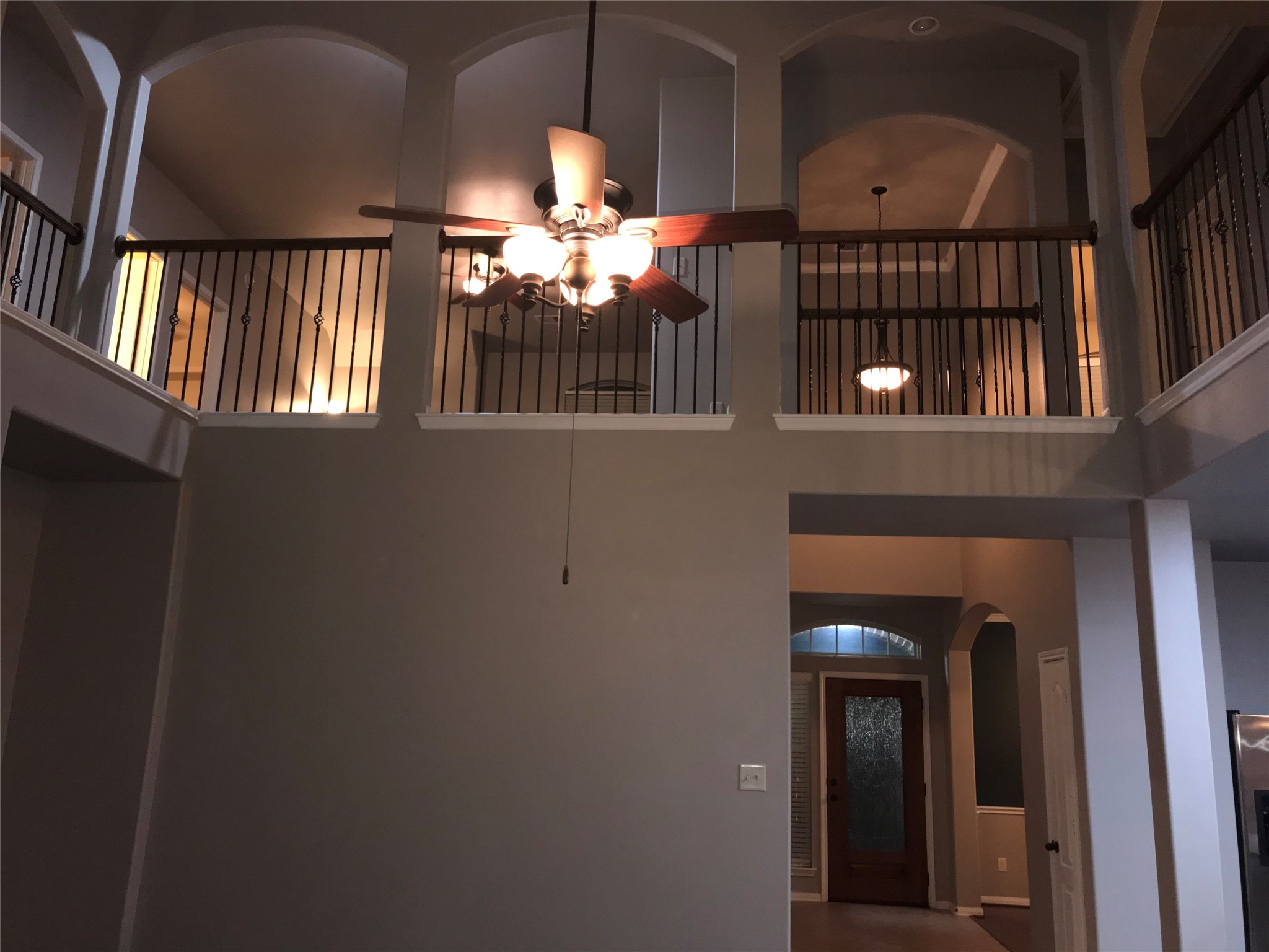 7936 Lake Commons Drive Rosenberg, TX 77469 - Photo 9 of 34 a view of a livingroom with furniture and staircase