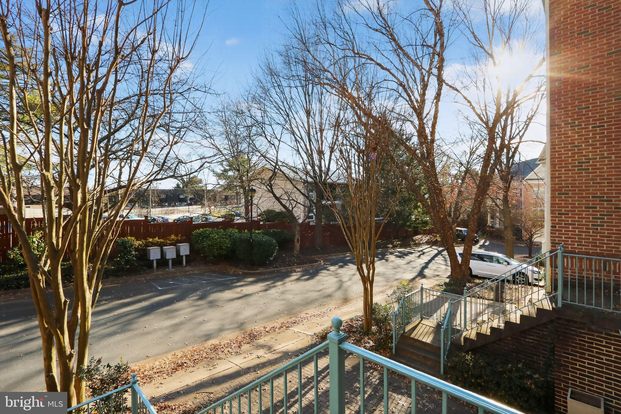 128 Rees Place Falls Church, VA 22046 - Photo 11 of 29 a view of a balcony with trees