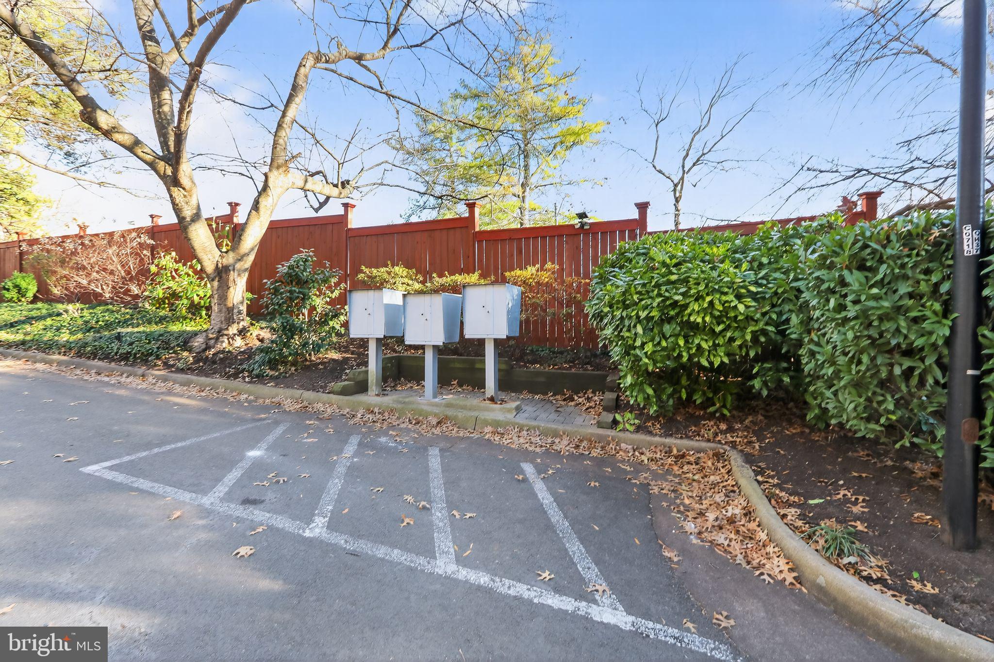 128 Rees Place Falls Church, VA 22046 - Photo 20 of 29 a view of a chairs and bench in a yard