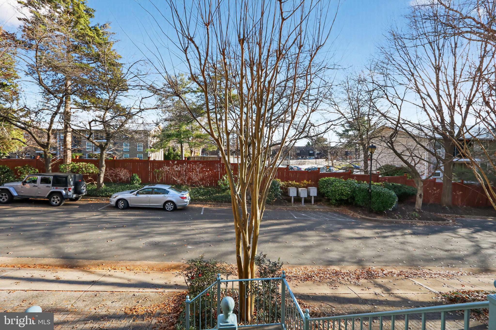 128 Rees Place Falls Church, VA 22046 - Photo 23 of 29 a view of a street with a building and trees