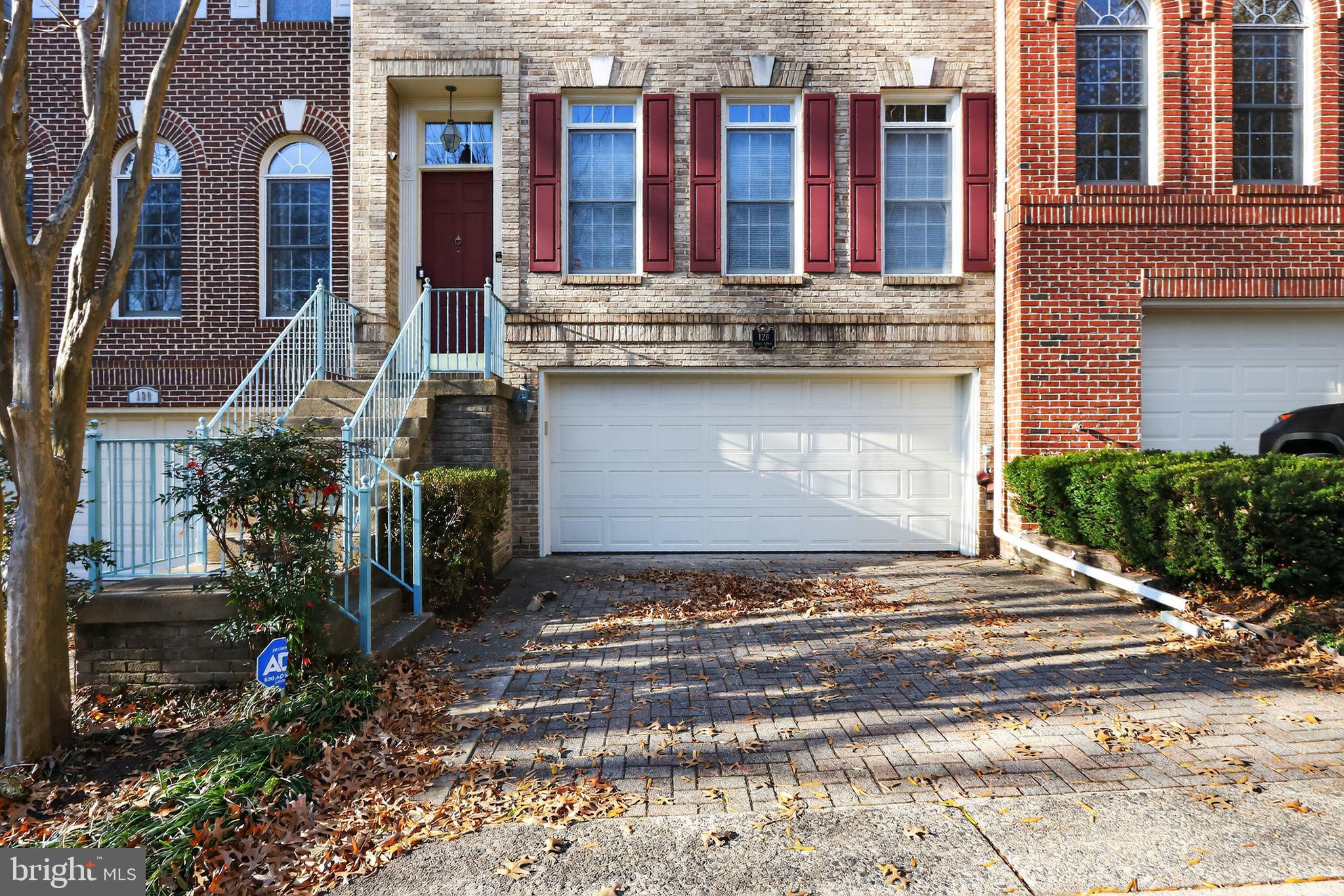 128 Rees Place Falls Church, VA 22046 - Photo 4 of 29 a view of a brick building with many windows