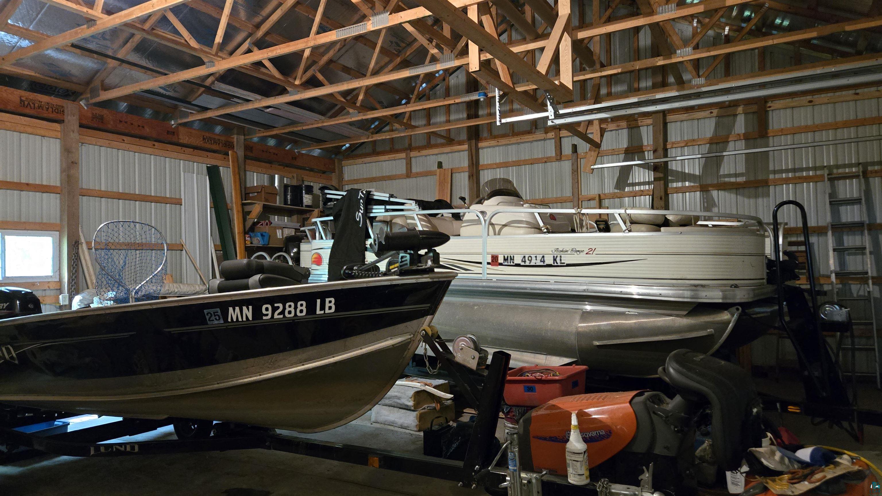 10898 Bessette Road Orr, MN 55771 - Photo 11 of 49 Garage featuring metal wall