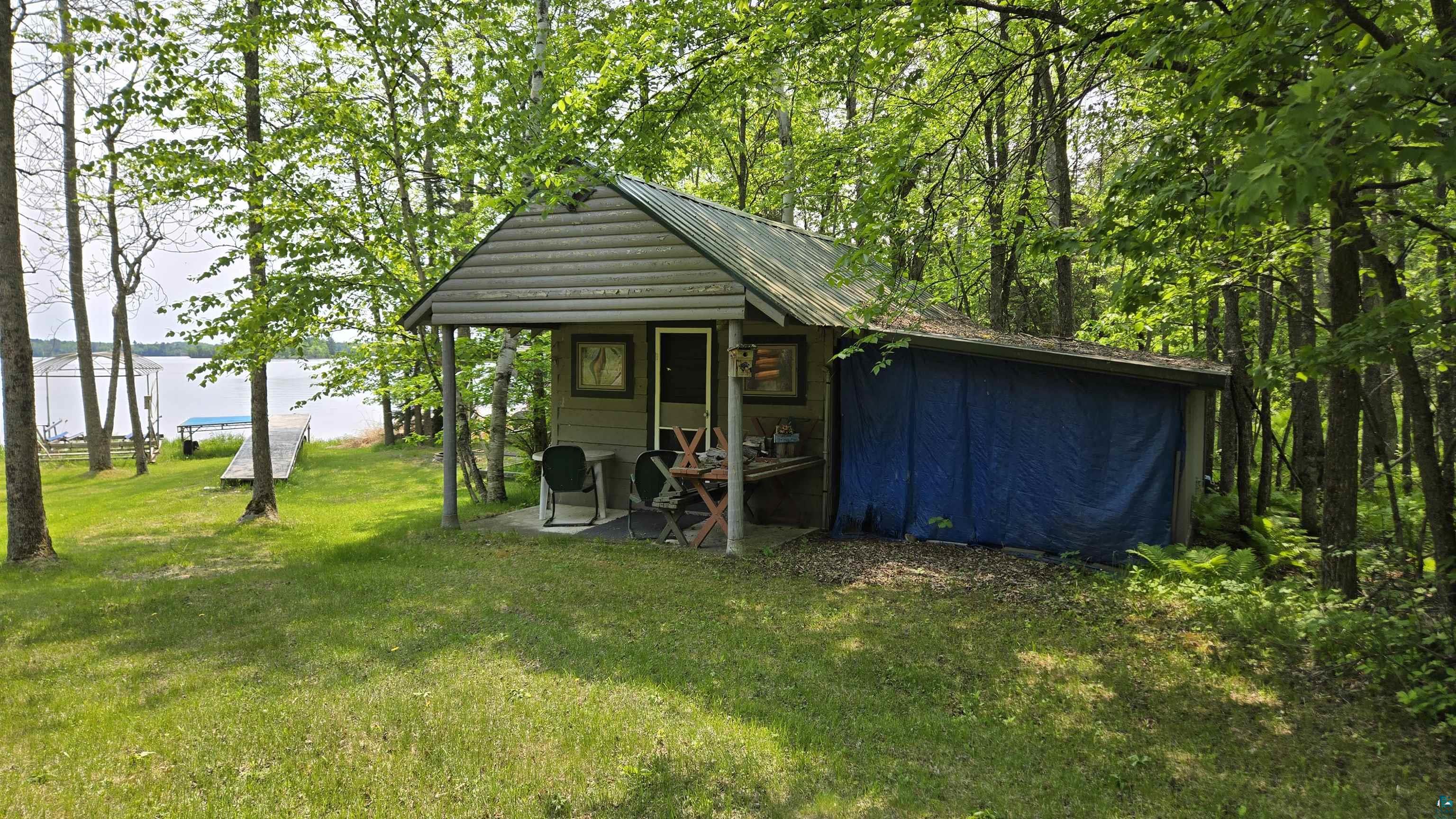 10898 Bessette Road Orr, MN 55771 - Photo 12 of 49 View of outdoor structure featuring a water view