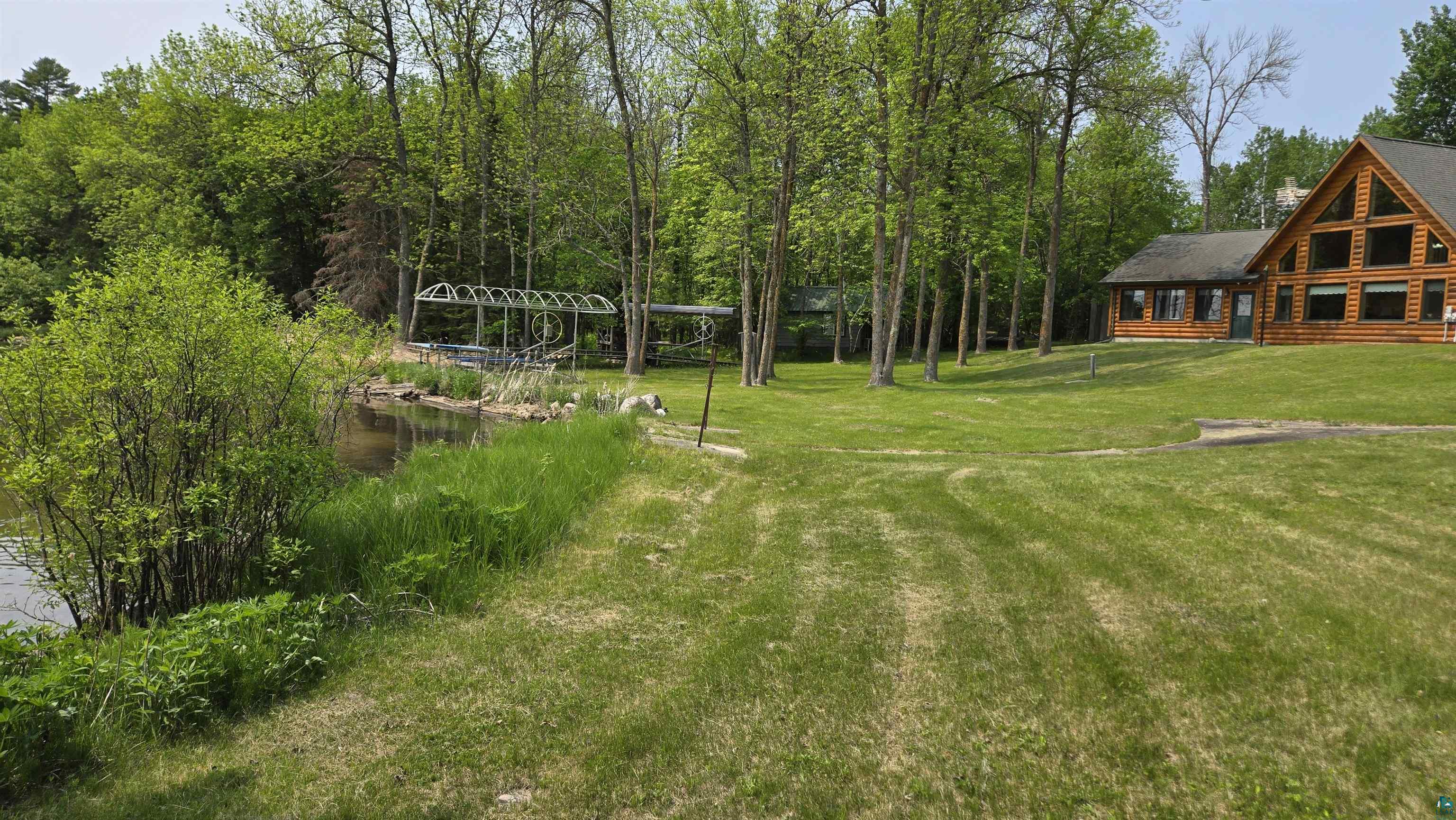 10898 Bessette Road Orr, MN 55771 - Photo 42 of 49 View of green lawn