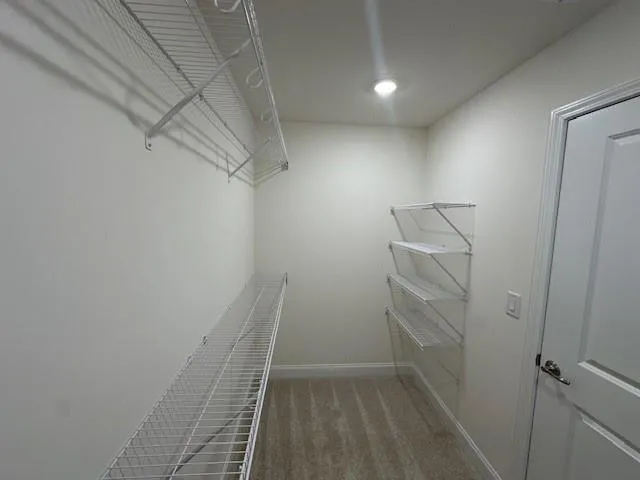 a bathroom with a toilet a sink and bathtub