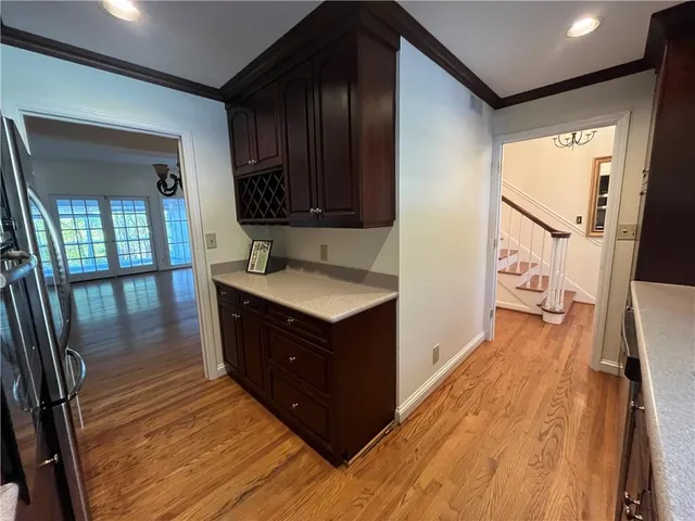 a en suite bathroom with a sink and a mirror
