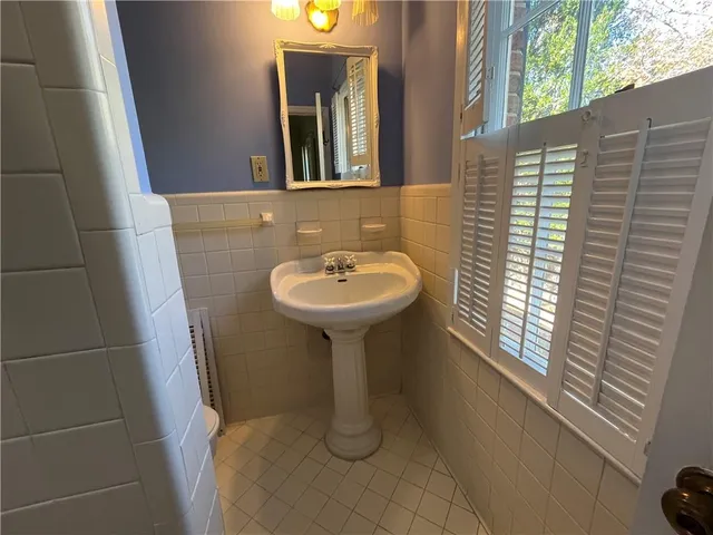 a view of a pathway with a yard