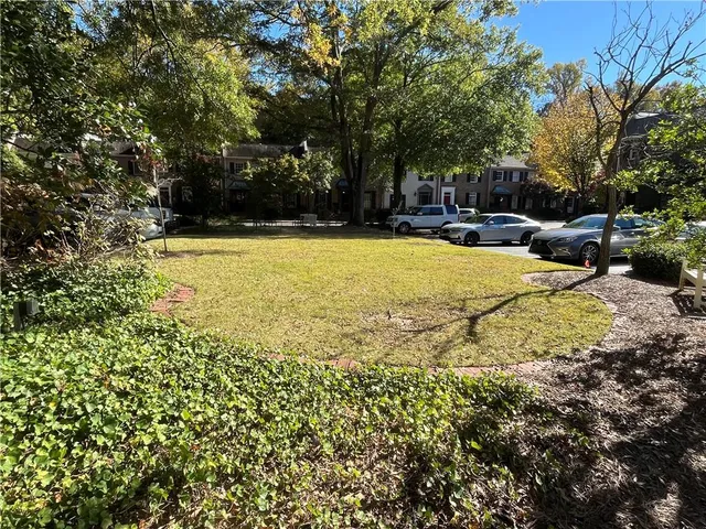 a view of road and trees