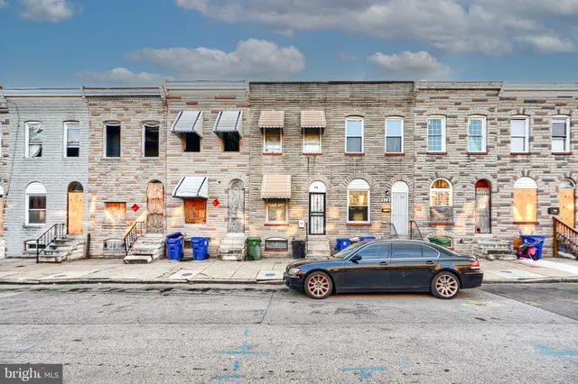 a car parked in front of a building
