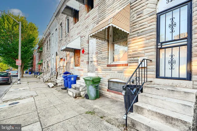 a view of a two chairs in the patio