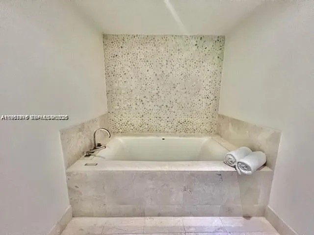 $7,100 | 17121 Collins Avenue, Unit 1007, Sunny Isles Beach, FL 33160