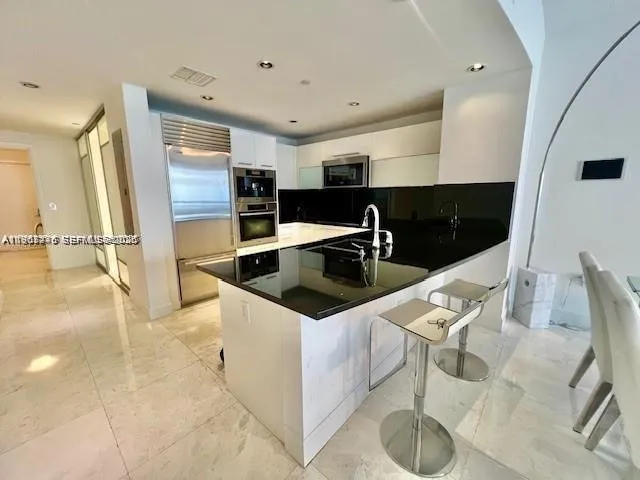 $7,100 | 17121 Collins Avenue, Unit 1007, Sunny Isles Beach, FL 33160