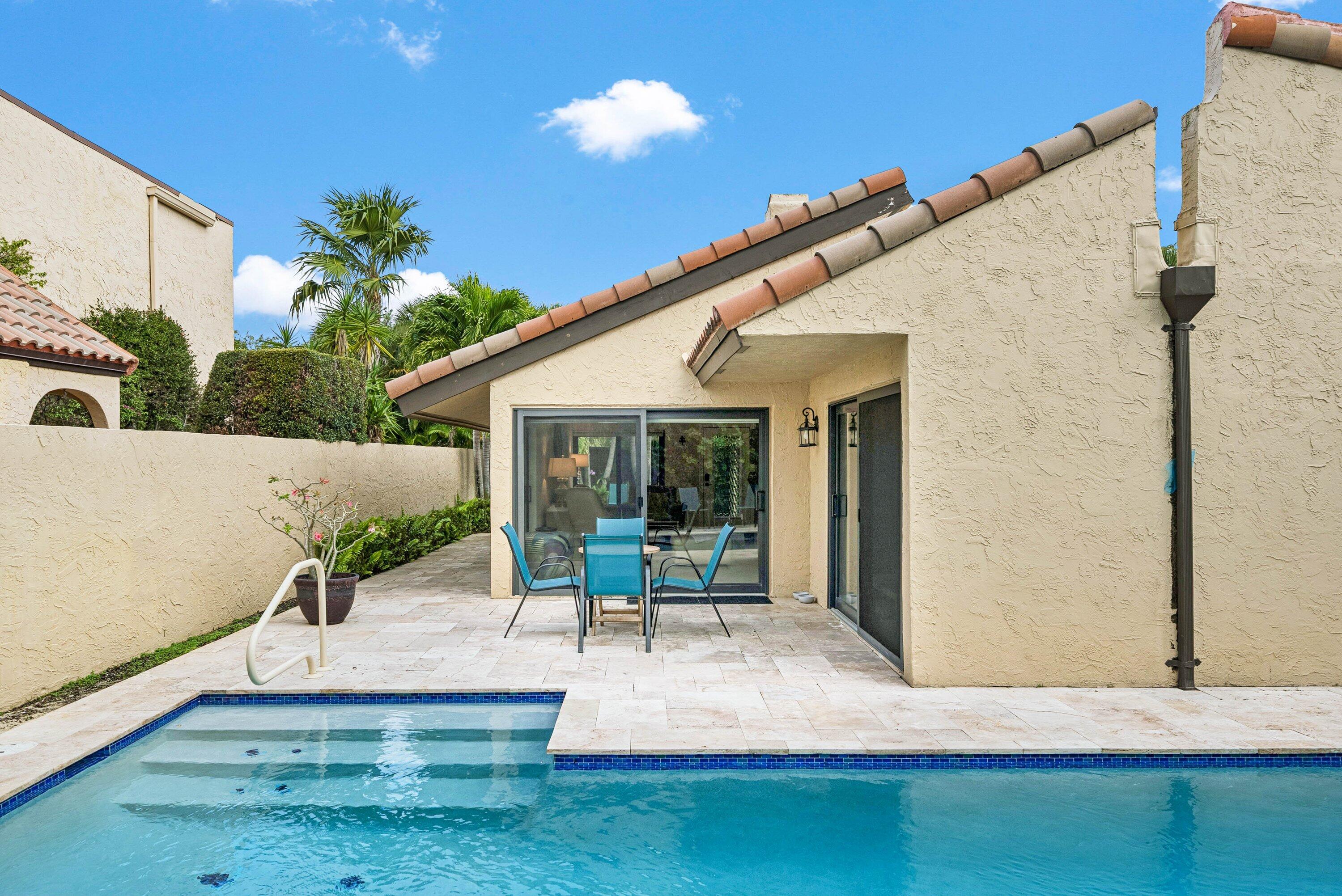 5926 Patio Drive Boca Raton, FL 33433 - Photo 28 of 33 a house view with a garden space