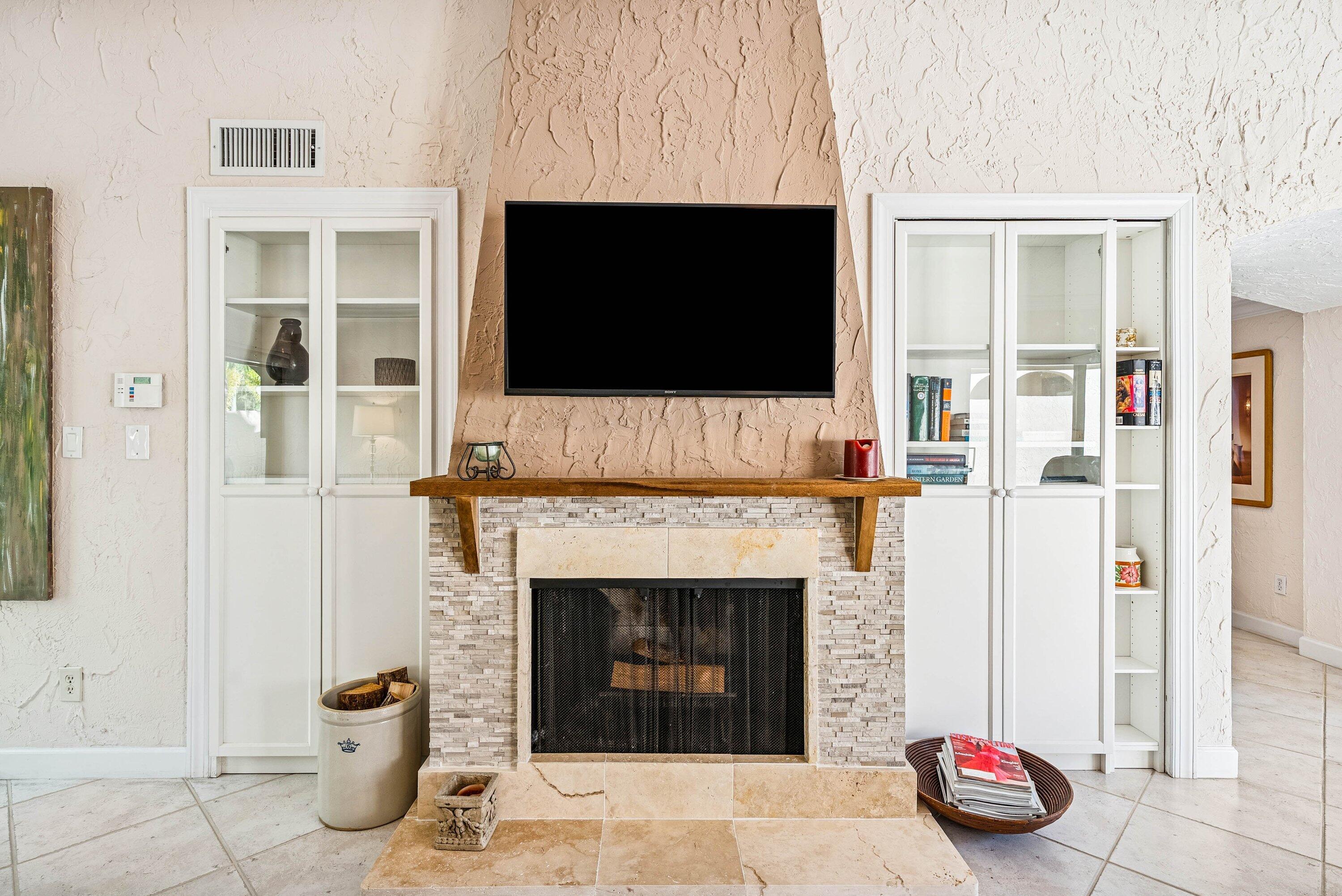 5926 Patio Drive Boca Raton, FL 33433 - Photo 7 of 33 a living room with furniture and a fireplace