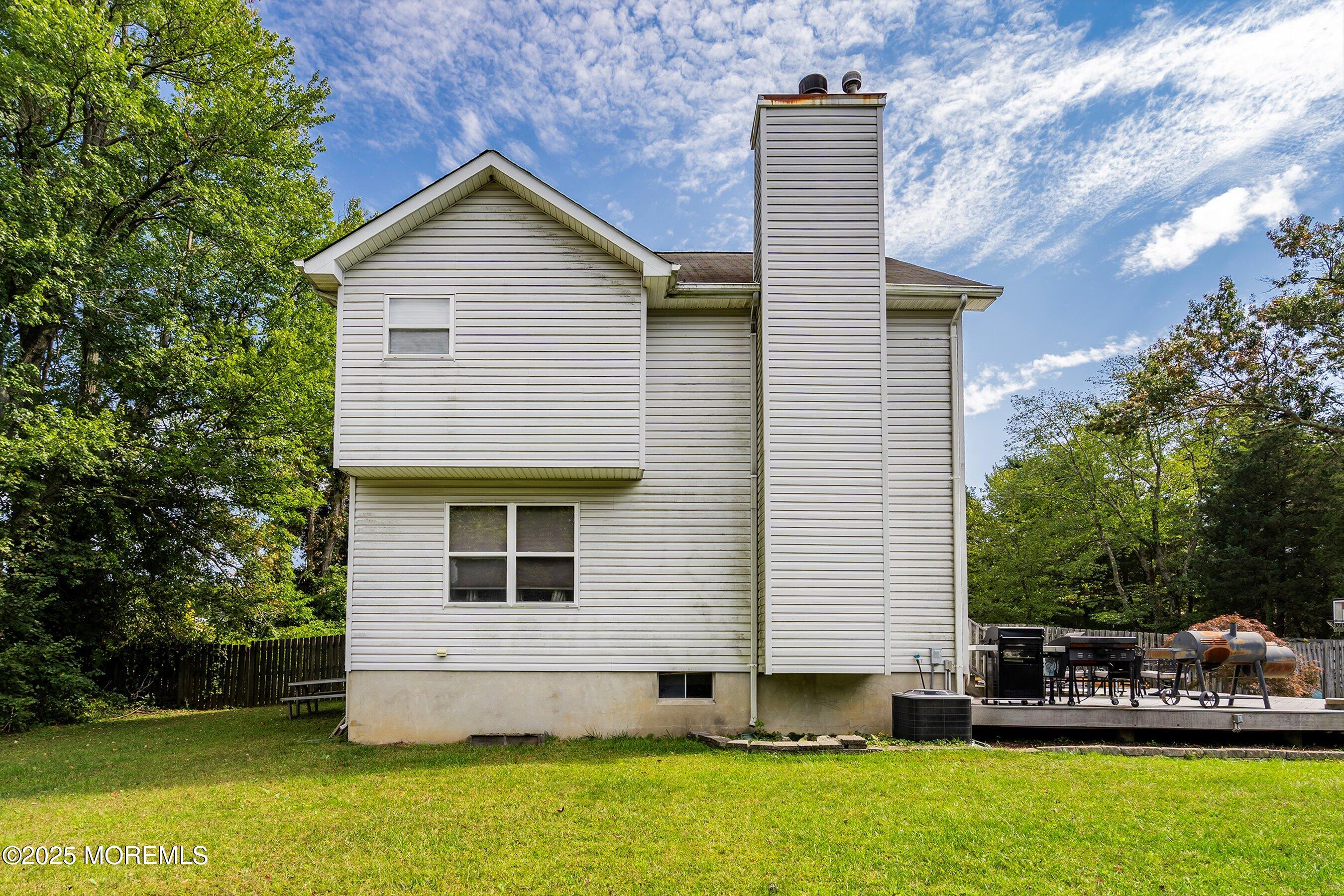 1090 Bennetts Mills Road Jackson, NJ 08527 - Photo 25 of 25 a front view of a house with a yard