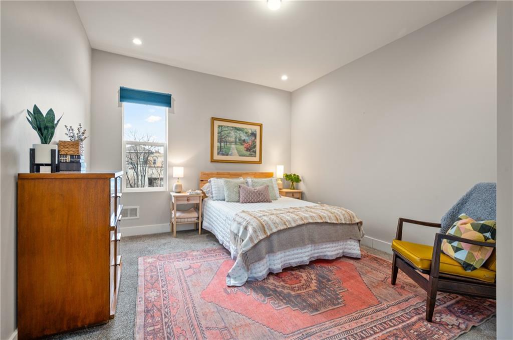 342 Harmar Street Pittsburgh, PA 15219 - Photo 18 of 30 Spacious upper bedroom with generous closet storage and neutral palette flexible for guest suite or office.