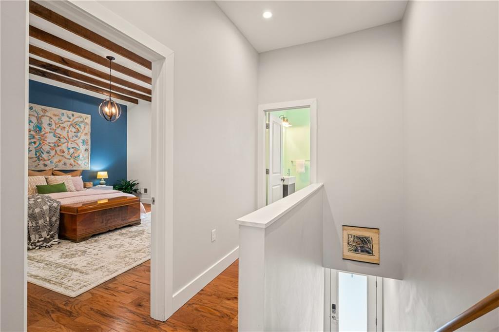 342 Harmar Street Pittsburgh, PA 15219 - Photo 19 of 30 Clean lines, neutral palette, and abundant recessed lighting continue upstairs for a cohesive, modern finish.