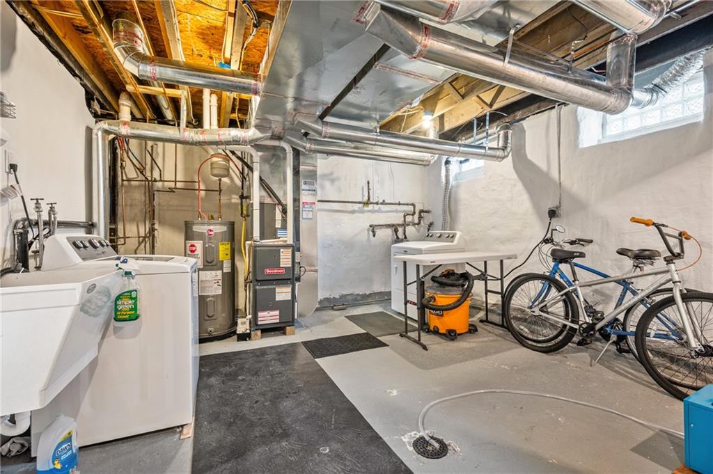 342 Harmar Street Pittsburgh, PA 15219 - Photo 25 of 30 Clean, dry basement with updated mechanicals, laundry area, and valuable storage or workshop flexibility.