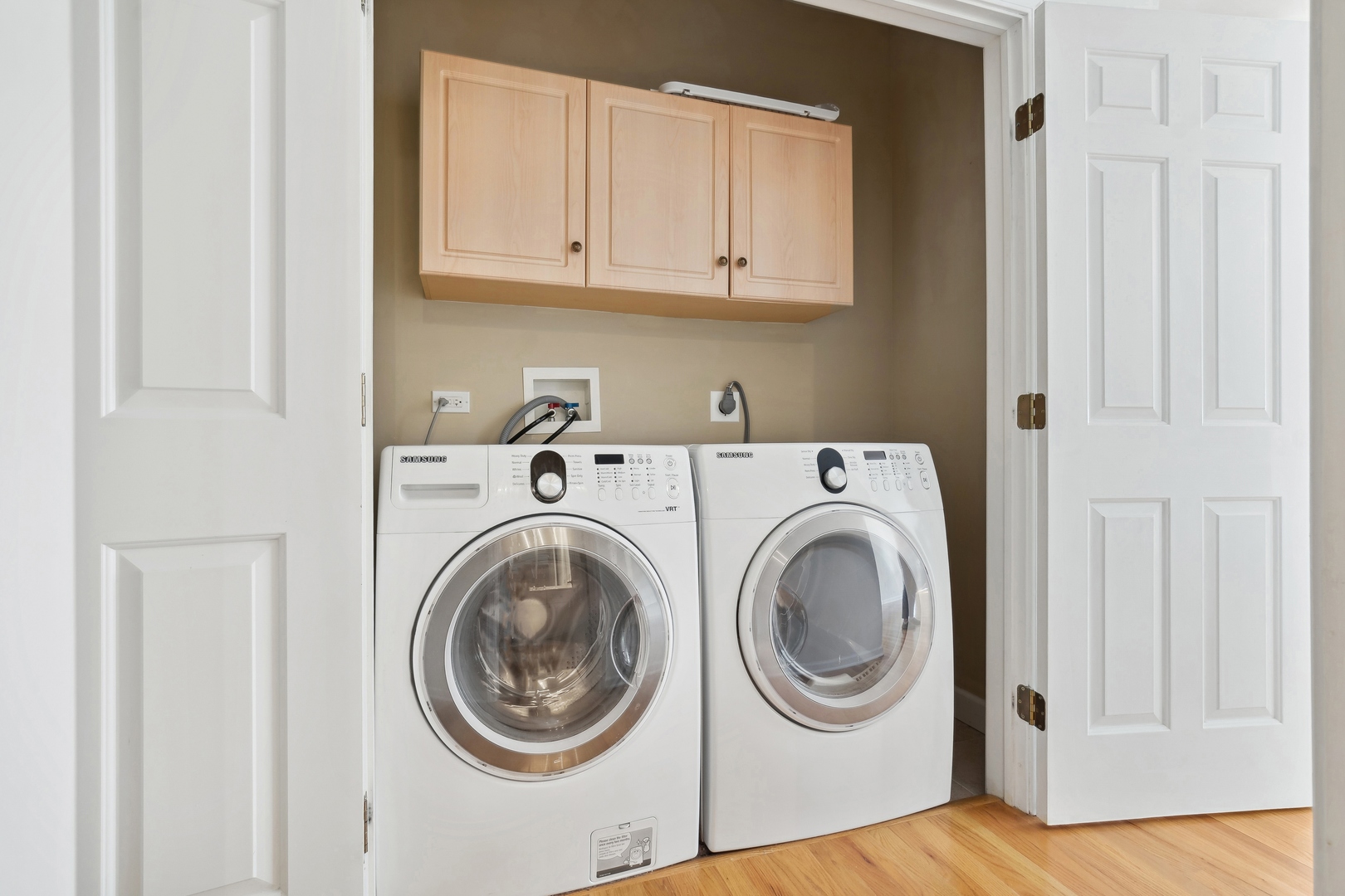25 Ronan Road, Unit 106 Highwood, IL 60040 - Photo 11 of 14 a utility room with dryer and washer