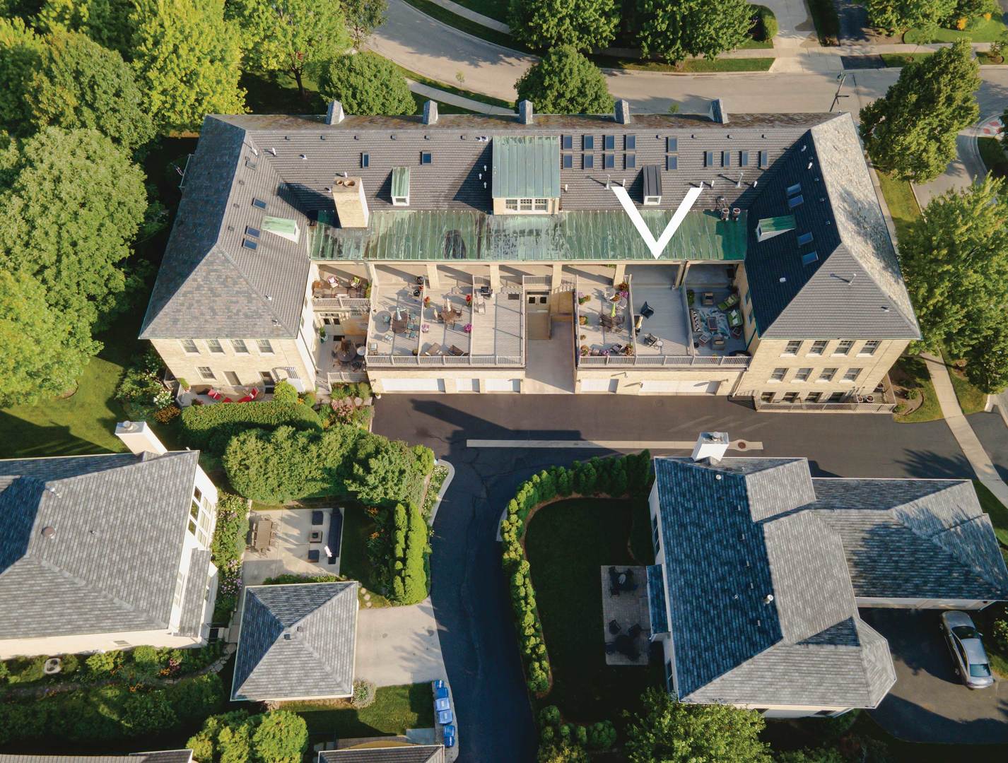 25 Ronan Road, Unit 106 Highwood, IL 60040 - Photo 3 of 14 an aerial view of multiple houses with outdoor space
