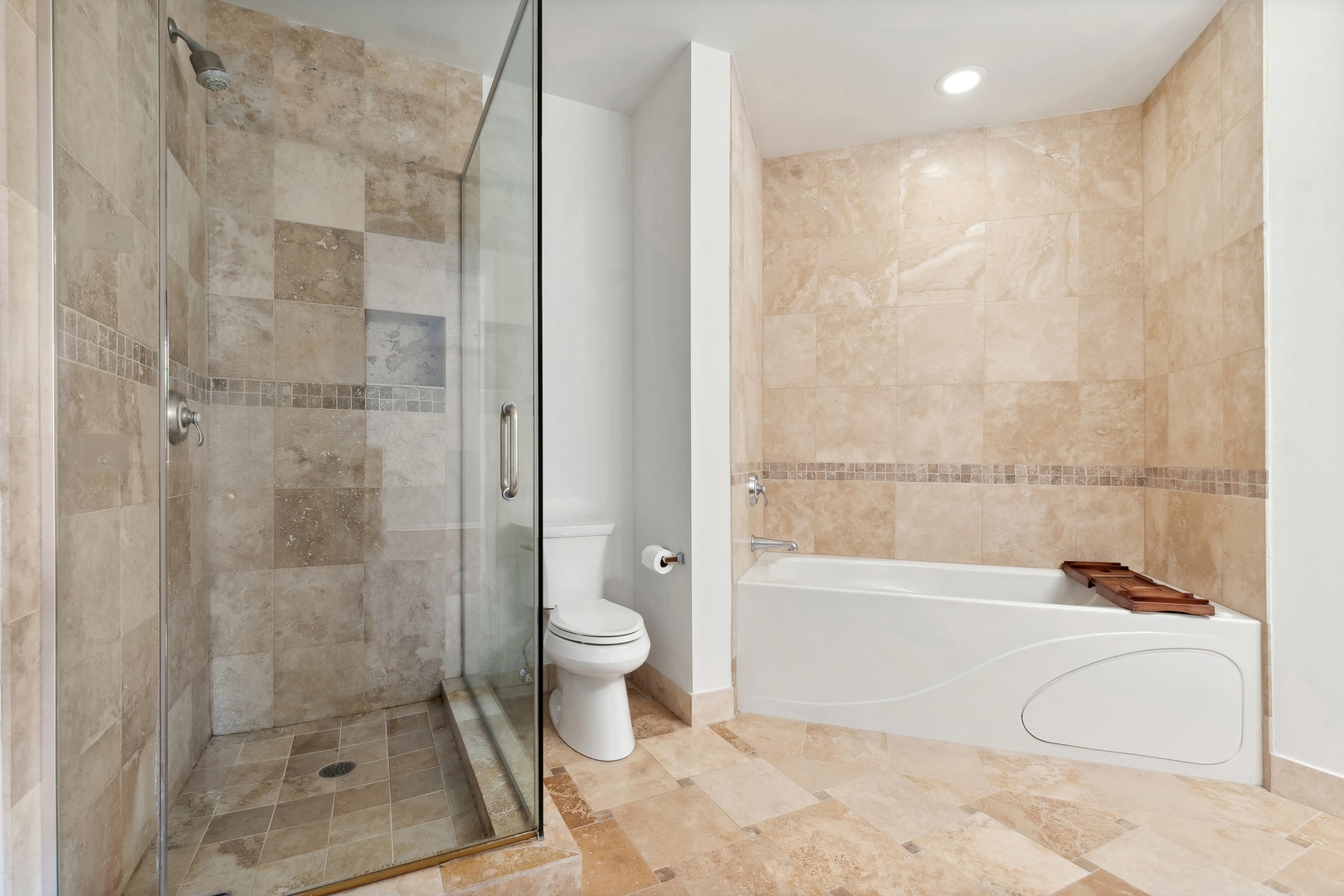25 Ronan Road, Unit 106 Highwood, IL 60040 - Photo 9 of 14 a bathroom with a granite countertop bathtub shower sink vanity and a toilet