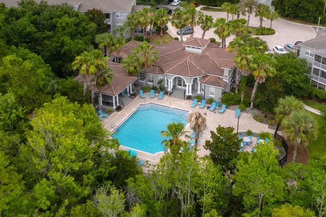 an aerial view of a house with a garden