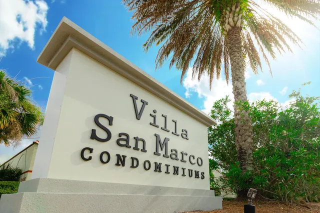 a sign that is on the side of a building