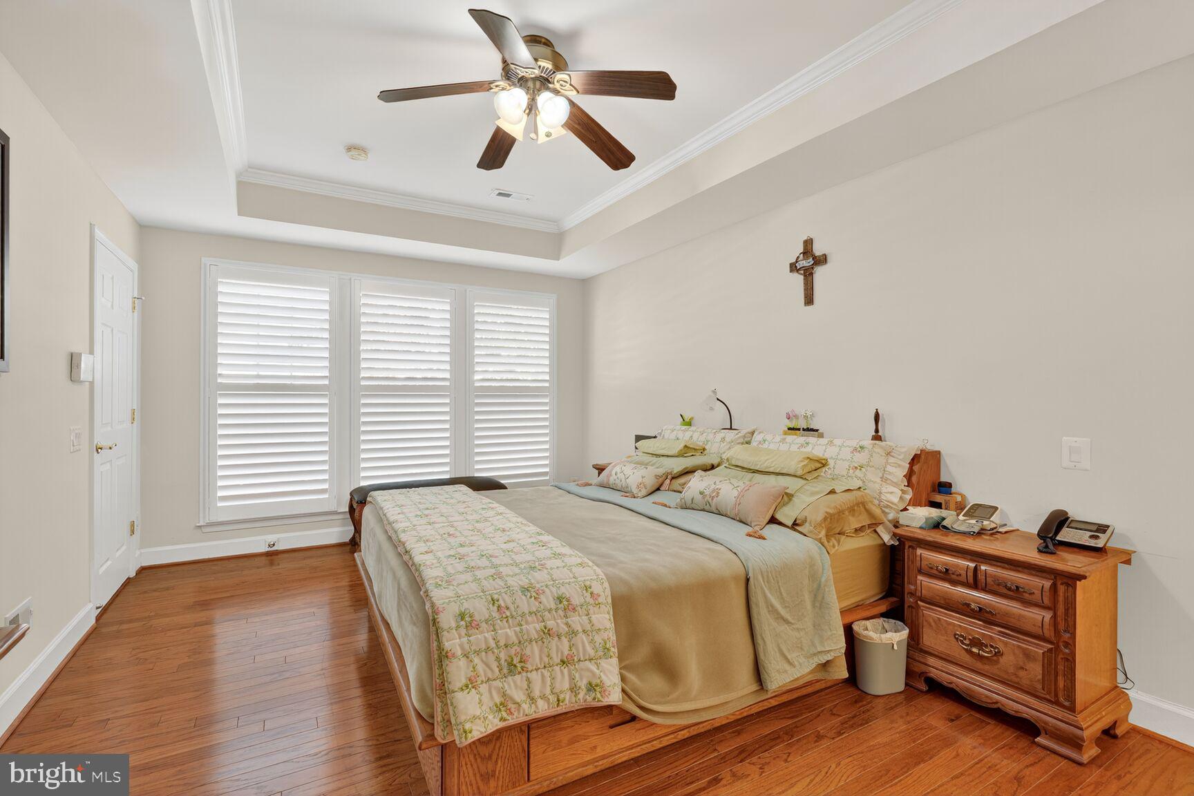 8912 Yellow Daisy Place Lorton, VA 22079 - Photo 14 of 24 a bed room with a bed and a window