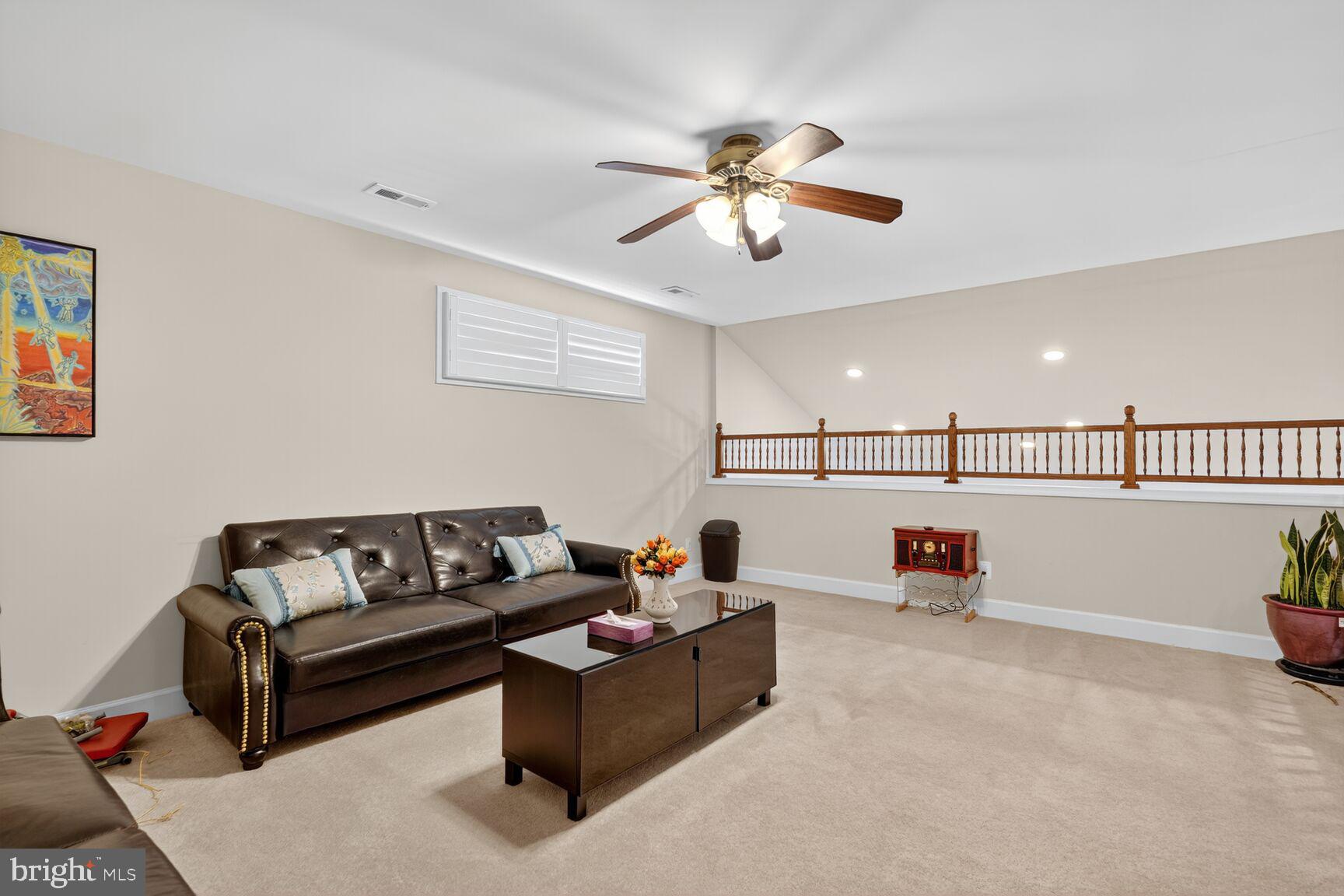 8912 Yellow Daisy Place Lorton, VA 22079 - Photo 16 of 24 a living room with furniture