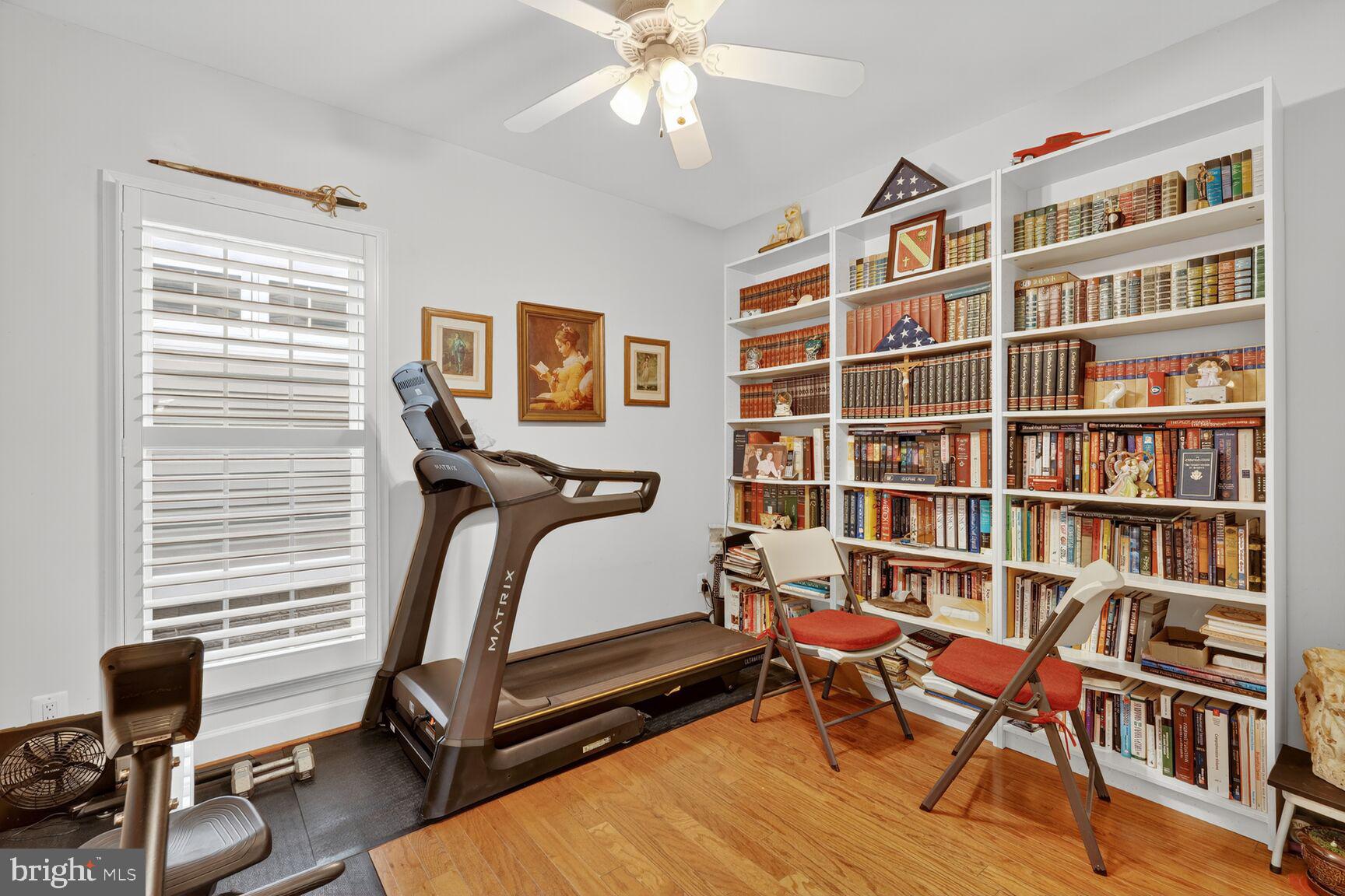 8912 Yellow Daisy Place Lorton, VA 22079 - Photo 18 of 24 a bedroom with workspace and a window