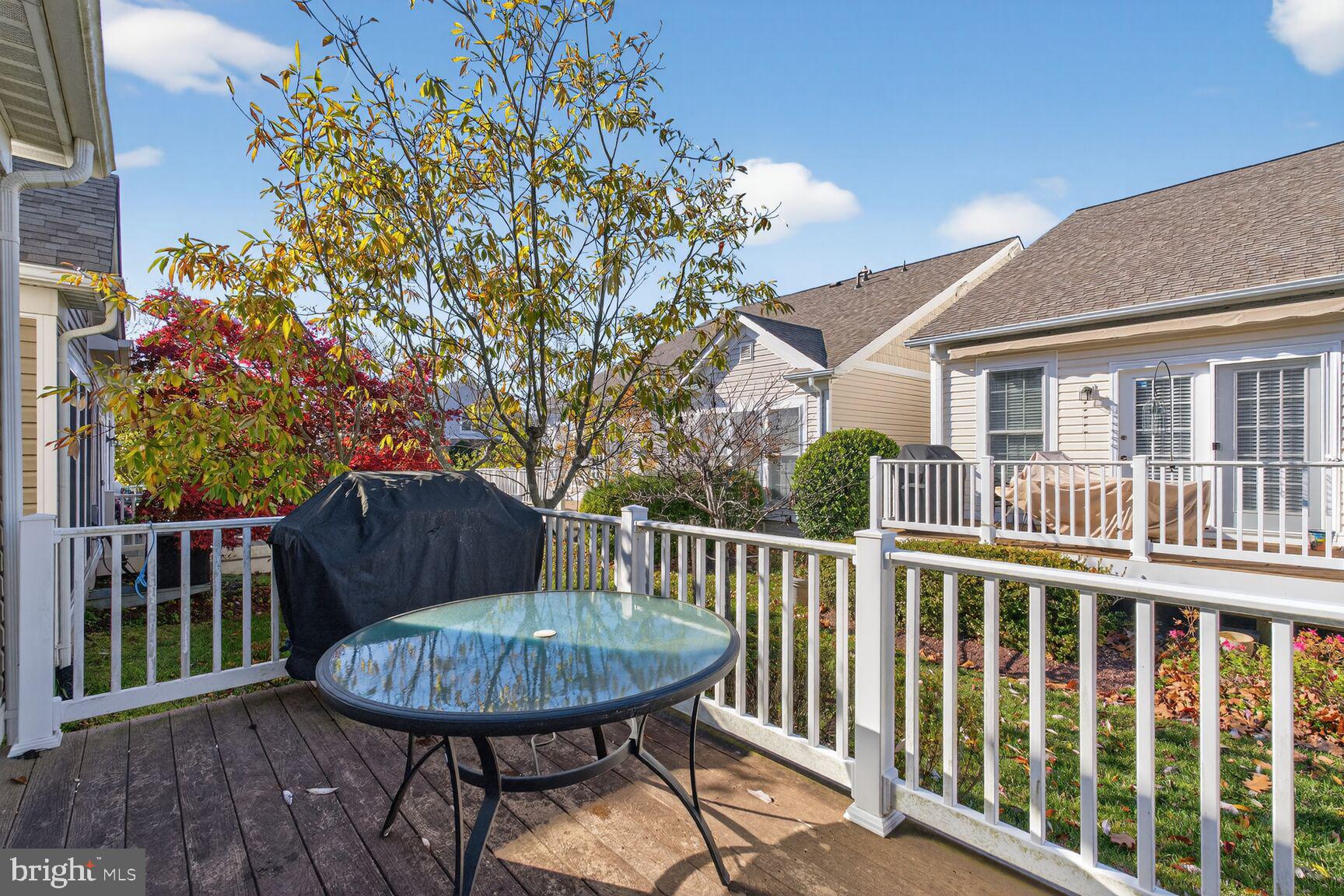8912 Yellow Daisy Place Lorton, VA 22079 - Photo 22 of 24 a view of a chair and table in the balcony