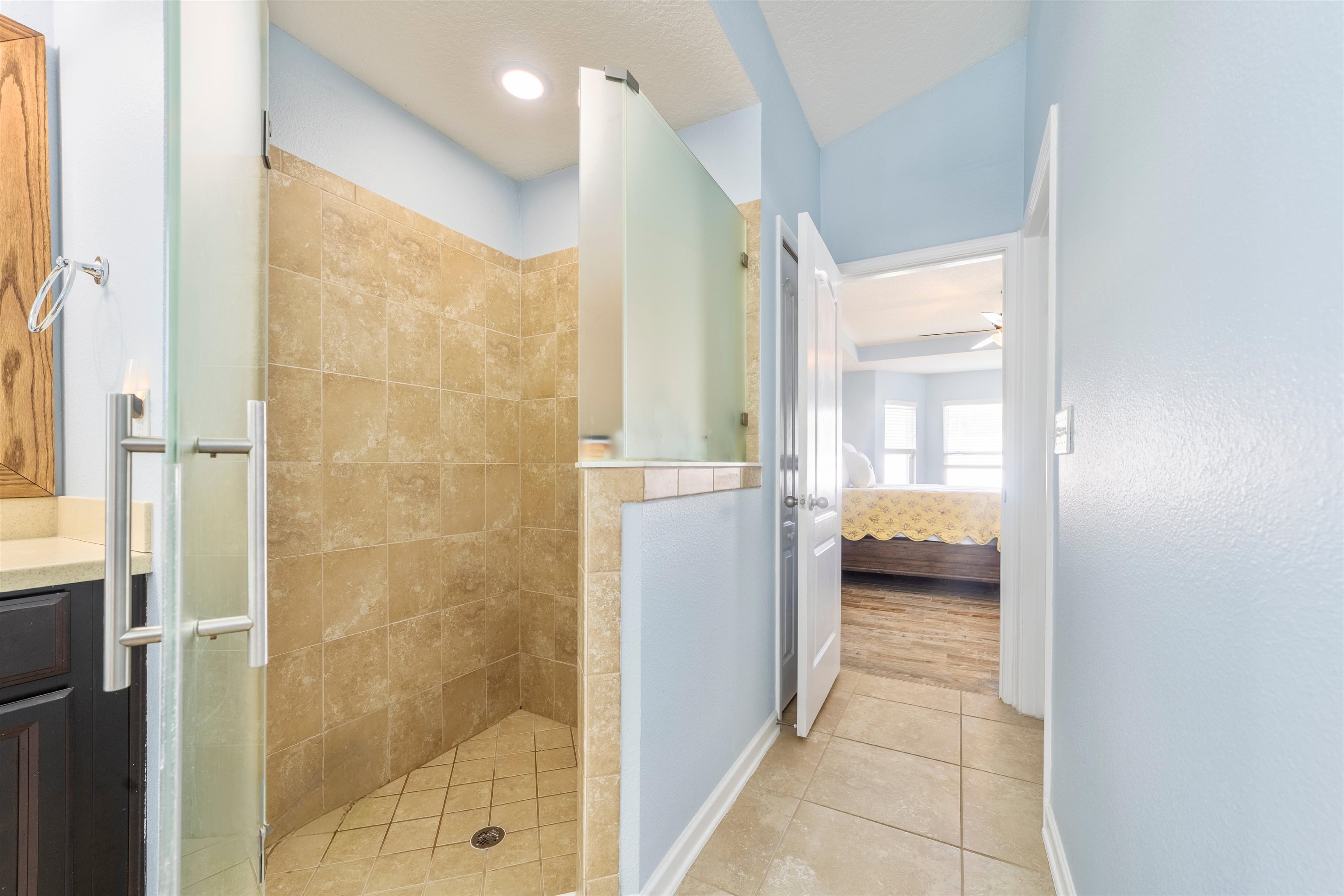 132 Fallen Timber Way St. Augustine, FL 32084 - Photo 23 of 47 Full bathroom with ensuite bathroom, a walk in shower, light tile patterned floors, and vanity
