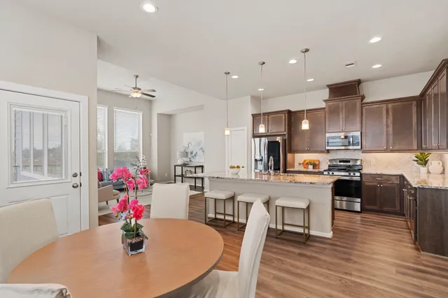 a kitchen with sink and window