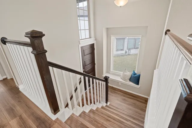 a view of entryway with wooden floor
