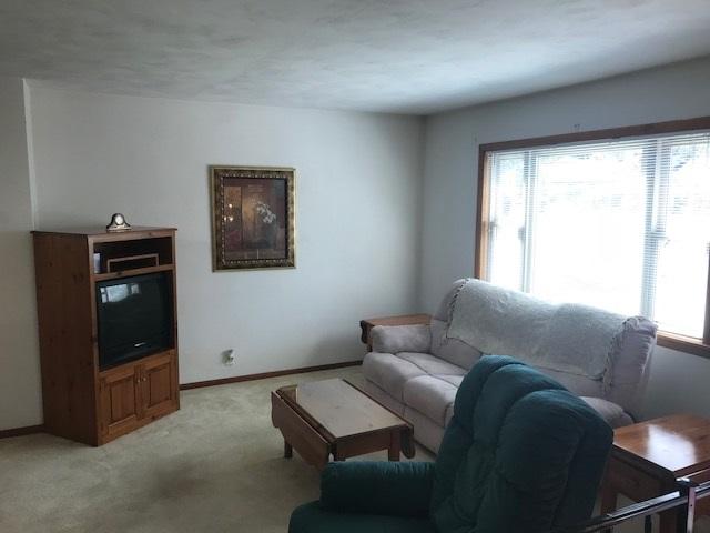 1956 Burma Road Salem, VA 24153 - Photo 3 of 25 a living room with furniture and a flat screen tv