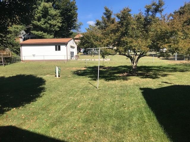 1956 Burma Road Salem, VA 24153 - Photo 24 of 25 a backyard of a house with a yard and outdoor seating