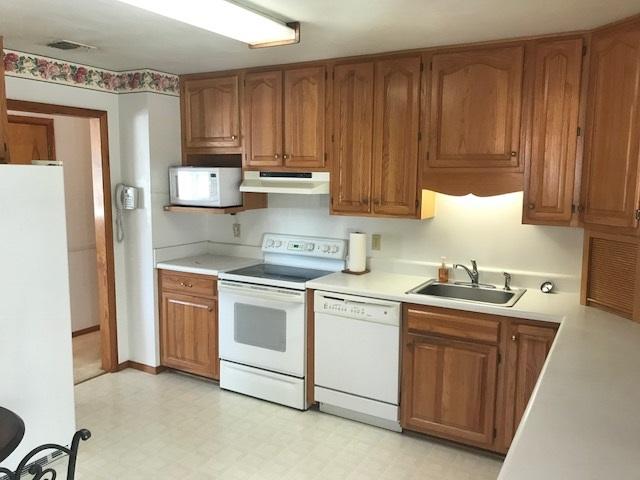 1956 Burma Road Salem, VA 24153 - Photo 4 of 25 a kitchen with stainless steel appliances granite countertop a refrigerator sink and cabinets