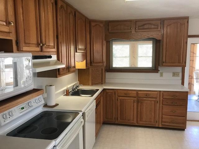 1956 Burma Road Salem, VA 24153 - Photo 6 of 25 a kitchen with stainless steel appliances granite countertop a sink stove and cabinets