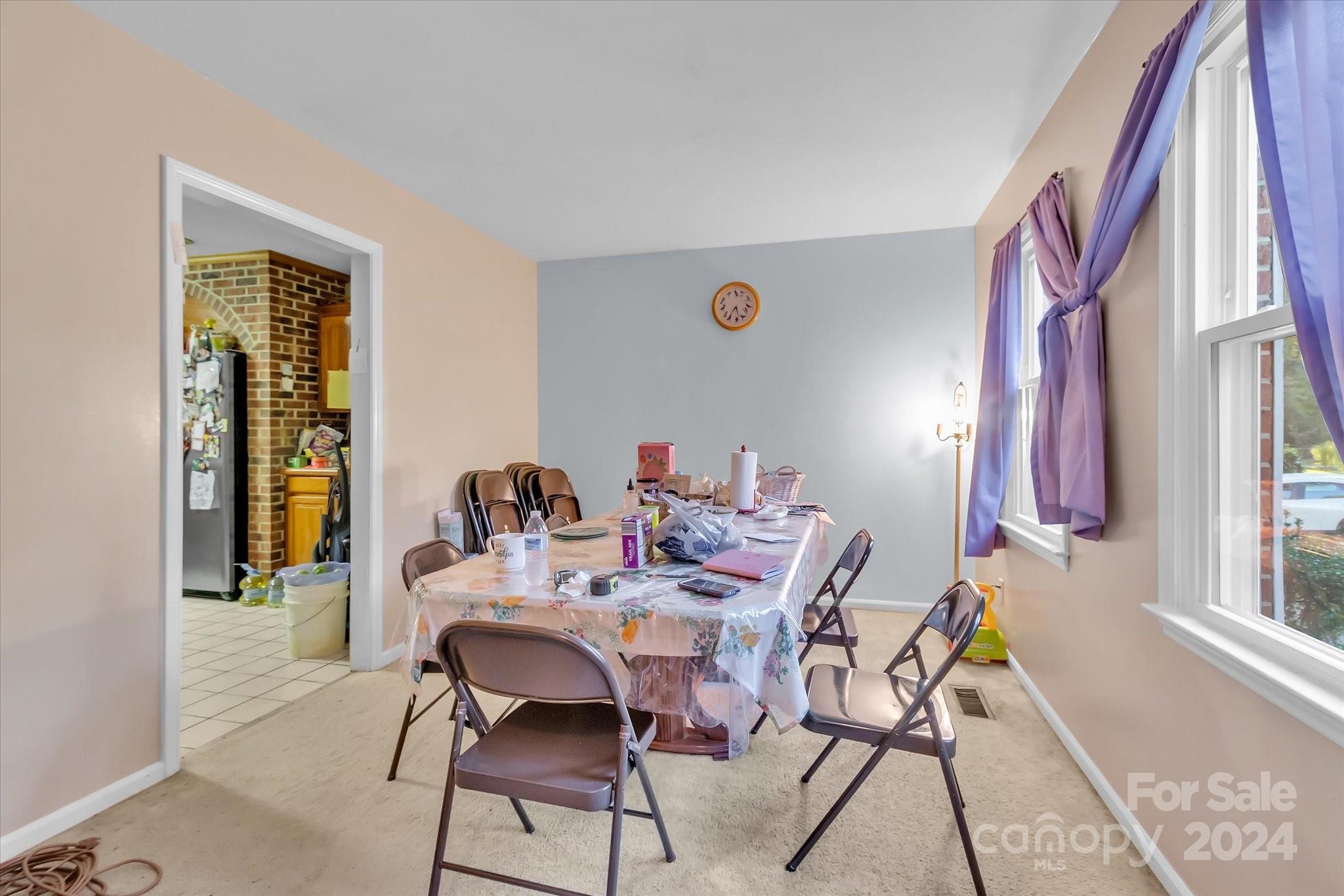 2131 Pinebrook Circle Charlotte, NC 28208 - Photo 14 of 23 a dining room with furniture and window