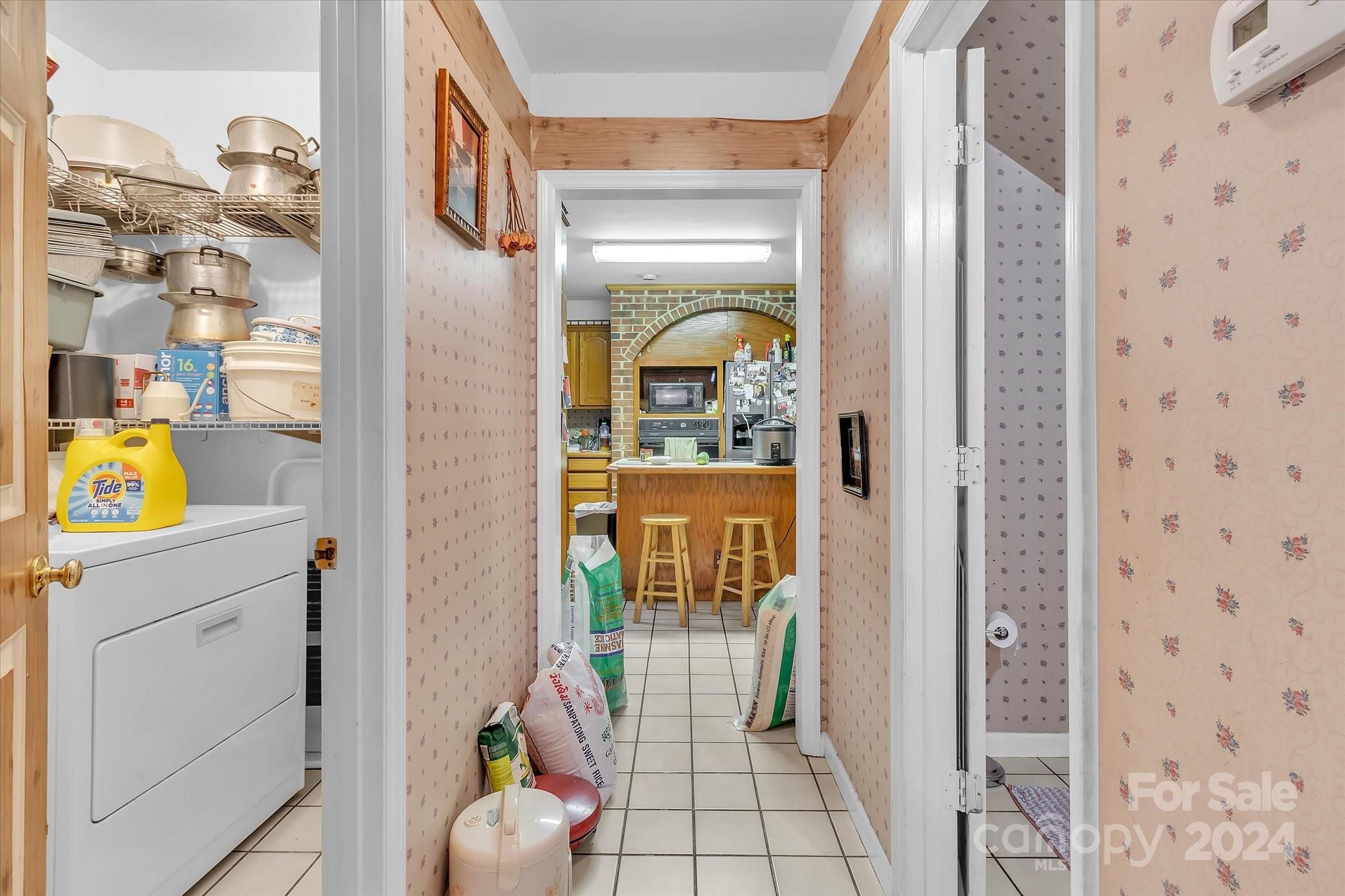 2131 Pinebrook Circle Charlotte, NC 28208 - Photo 17 of 23 a bathroom with a sink and mirror