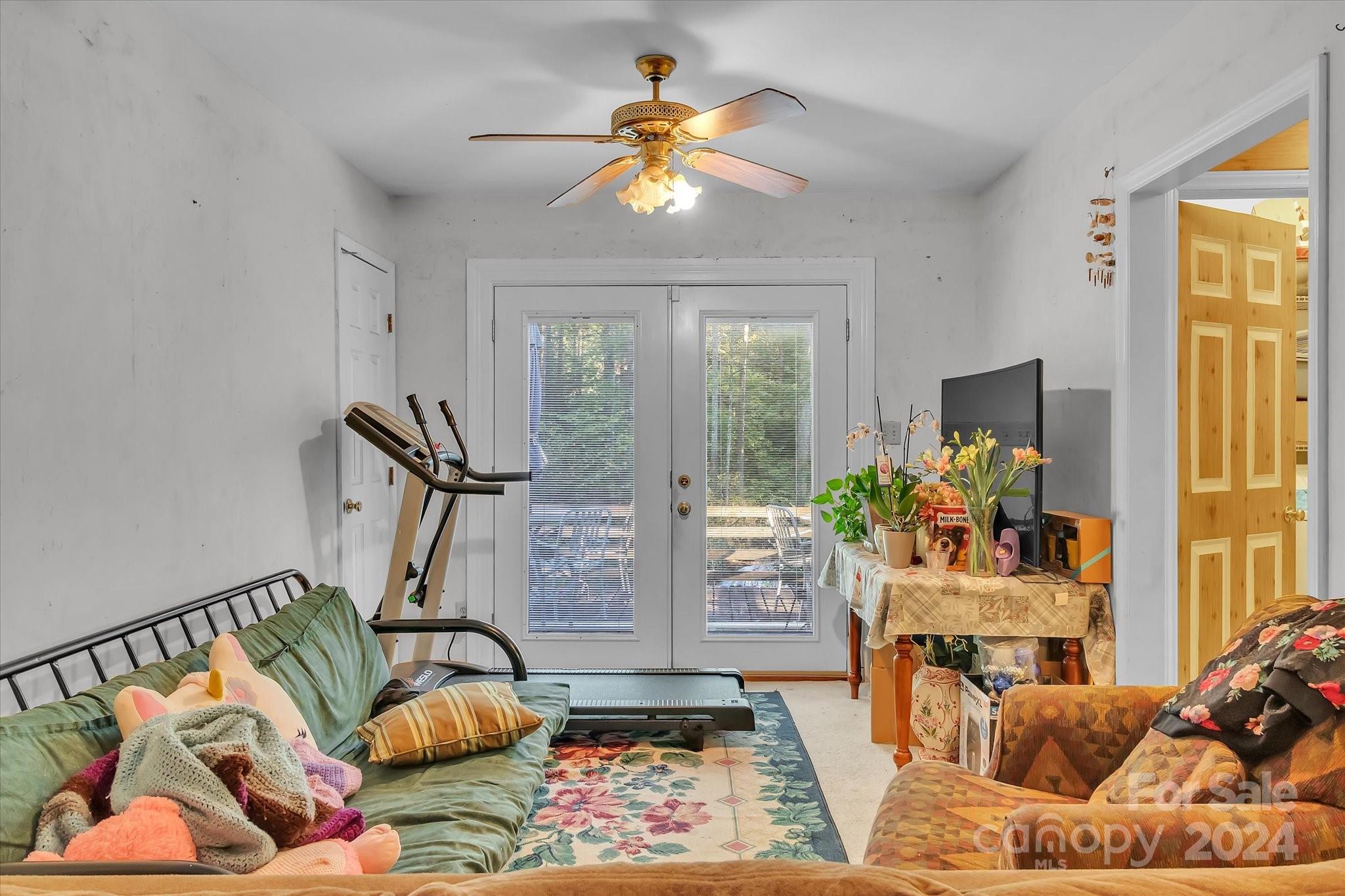 2131 Pinebrook Circle Charlotte, NC 28208 - Photo 18 of 23 a living room with furniture and a large window