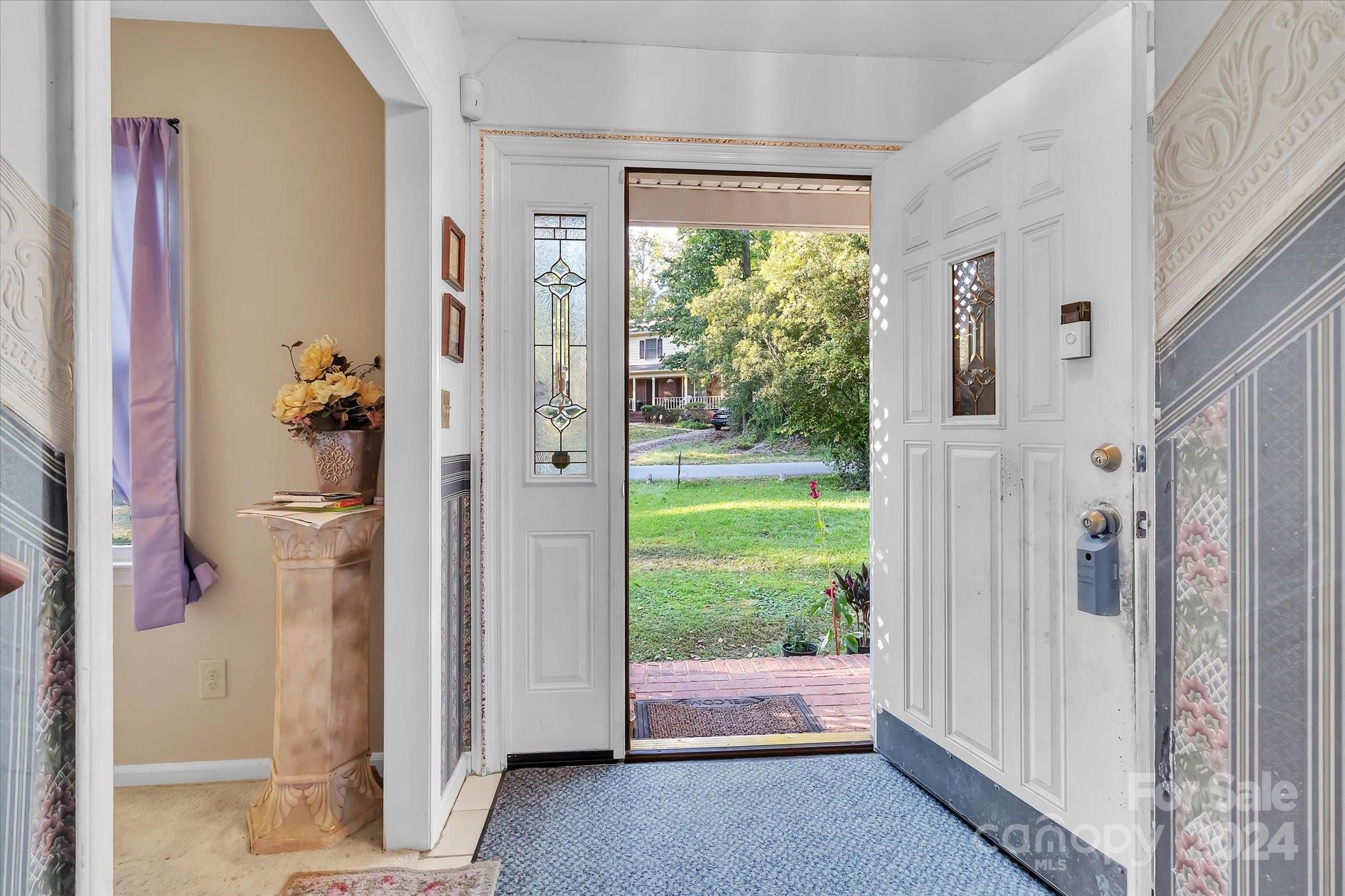 2131 Pinebrook Circle Charlotte, NC 28208 - Photo 21 of 23 a view of entryway with bathroom and front door