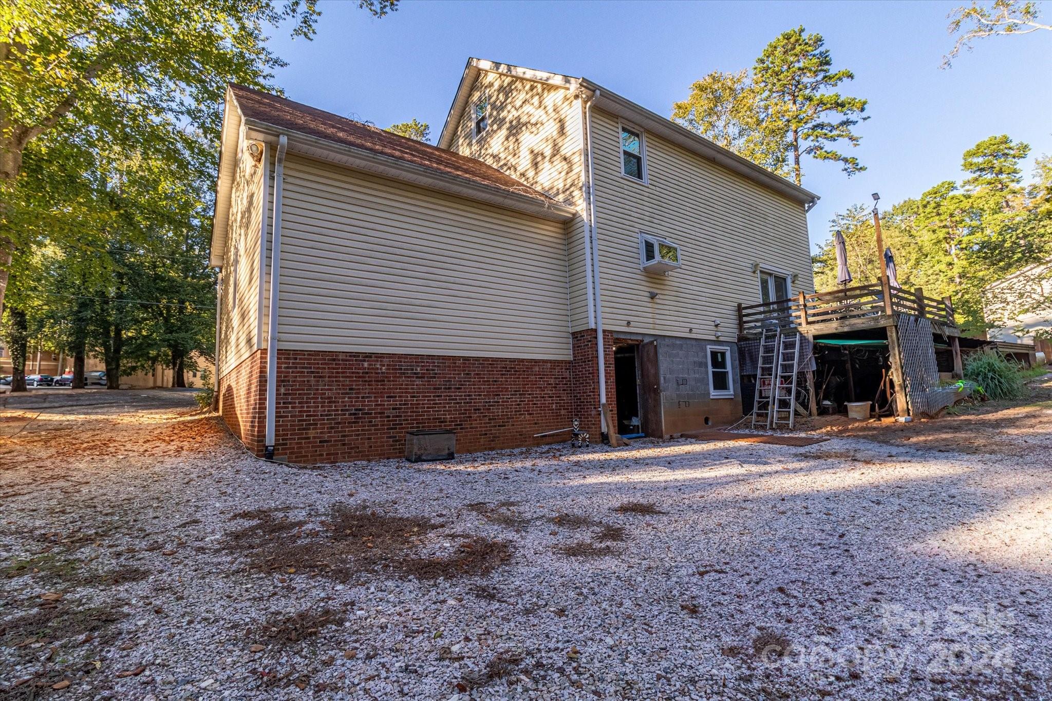 2131 Pinebrook Circle Charlotte, NC 28208 - Photo 6 of 23 a view of a house with a yard and garage