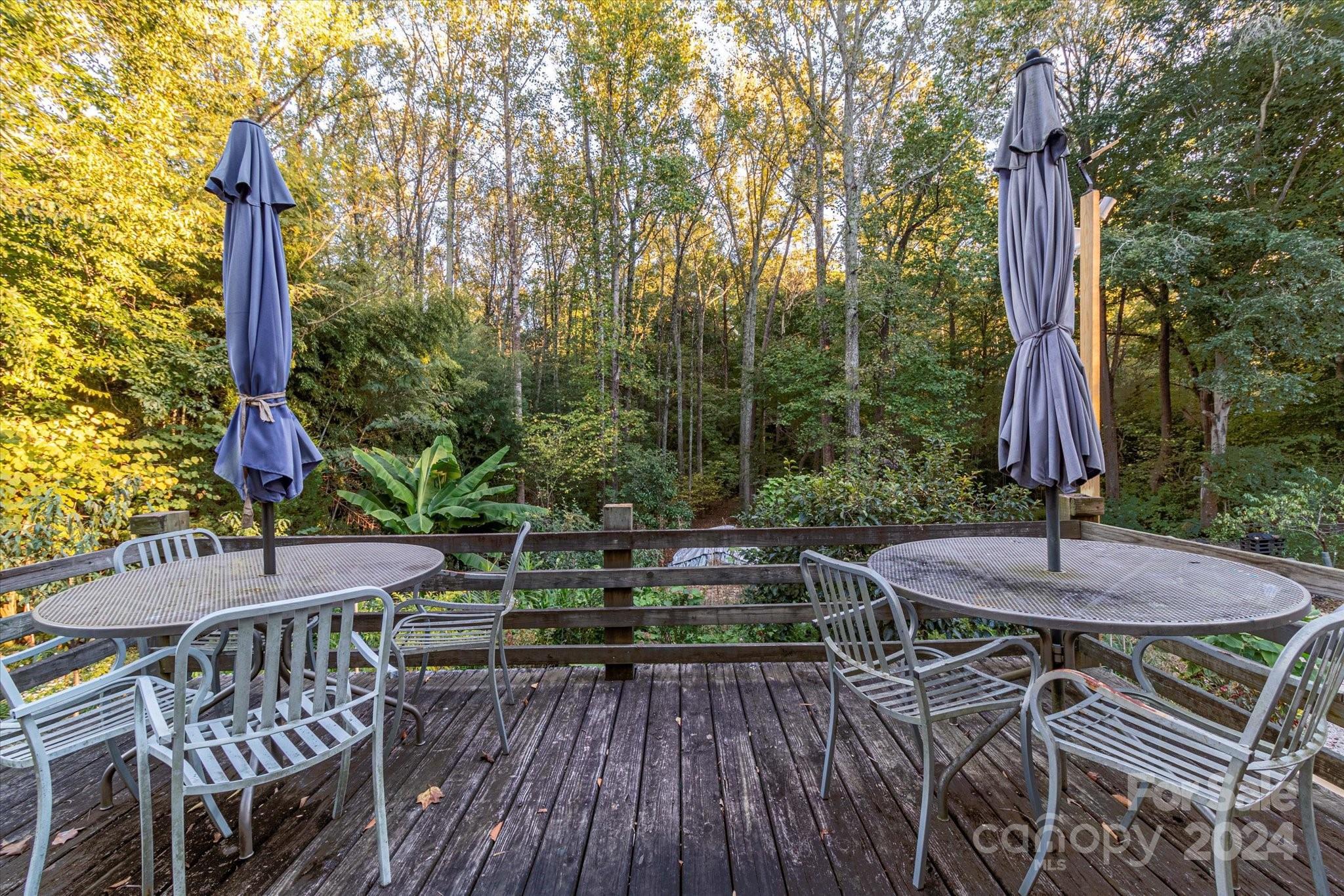 2131 Pinebrook Circle Charlotte, NC 28208 - Photo 8 of 23 a view of an outside dining space with a table and chairs